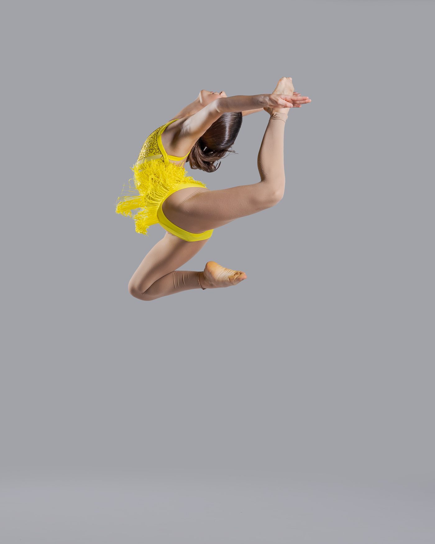Alumna en salto de showdance